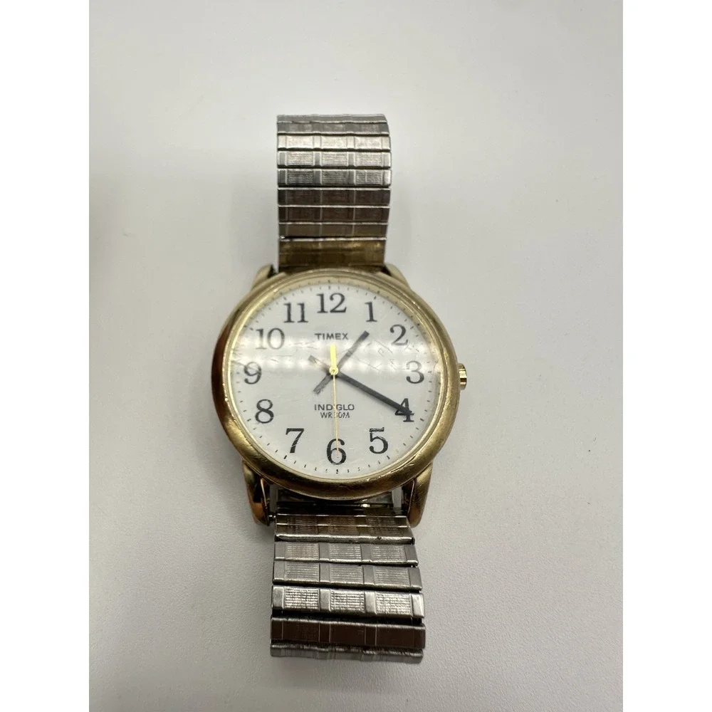 Timex Indiglo Men's Gold Tone Day Date Quartz Wristwatch WR 30M Stretch Band